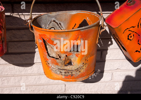 Halloween artwork, 'pumpkin' made from metal pail and can USA Stock Photo