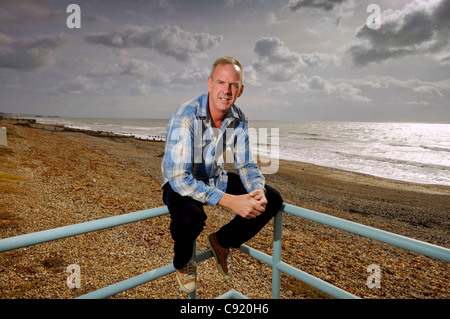 Norman Cook aka Fatboy Slim at his Brighton beach front home in East Sussex UK. Stock Photo