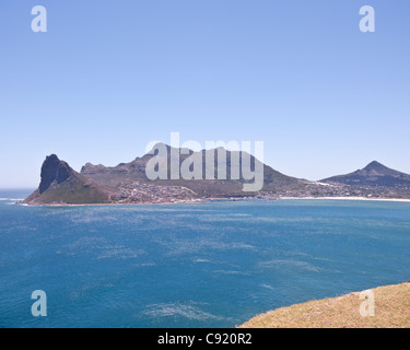The Sentinel is a mountain peak that guards the entrance to Hout Bay Harbor near Cape Town in South Africa. Stock Photo