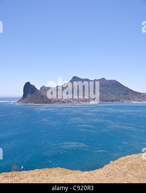 The Sentinel is a peak that guards the entrance to Hout Bay Harbor near Cape Town in South Africa. Stock Photo