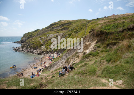 Lulworth Cove a horseshoe harbour and natural feature of the eroded coastline is on the Jurassic Coast and is part of the Stock Photo