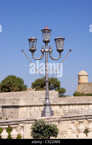 Wrought iron street lamps in the Upper Barracca Gardens in Valletta. Stock Photo