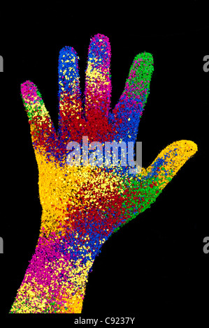 Childs multicoloured hand print on black background Stock Photo