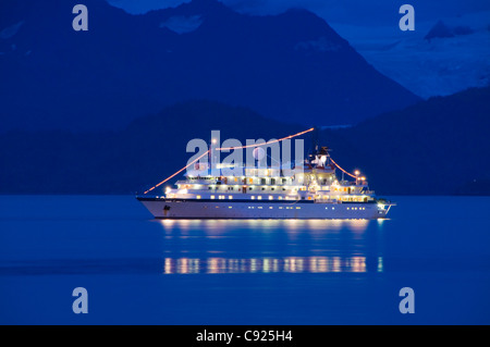 The cruise ship Spirit of Oceanus at dusk near Homer Spit, Kachemak Bay, Southcentral Alaska, Summer Stock Photo