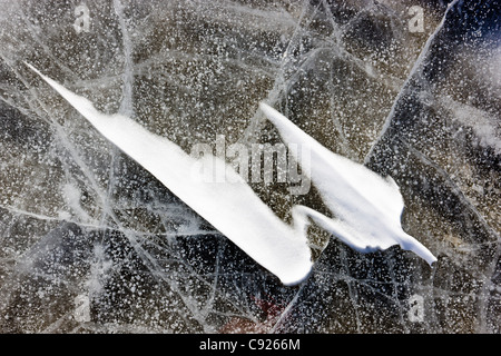 Detail shot of Sastrugi, wind carved ridges of snow, on top of the frozen ice of the Nenana River,  Southcentral Alaska, Winter Stock Photo