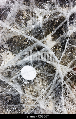 Close up of cracks in the ice of Nenana River near Denali National Park, Southcentral Alaska, Winter Stock Photo