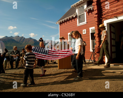 Flag raising at the Grand Opening of the General Manager's Office, Kennicott Mine, Wrangell-St. Elias National Park, Alaska Stock Photo