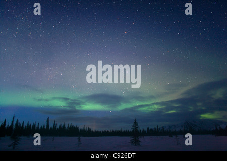 View of Aurora Borealis over the foothills of the Alaska Range, Broad Pass, Southcentral Alaska, Winter Stock Photo