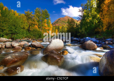 Low angle view of water rushing over rocks in Little Susitna River  Hatcher Pass, Southcentral Alaska Stock Photo