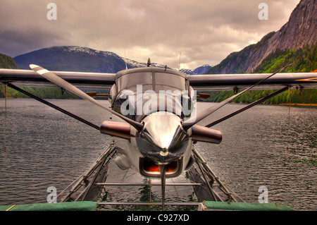 Close up of a DeHavilland DHC-3 Otter docked to a boat in Punchbowl Cove, Misty Fjords National Monument, Southeast Alaska, HDR Stock Photo