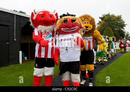 The quirky annual Mascot Grand National, held in aid of charity in October at Huntingdon Racecourse, Cambridgeshire, England Stock Photo