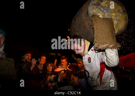 The quirky annual Carrying the Flaming Tar Barrels, held on Bonfire night in the small town of Ottery St Mary, in Devon, England Stock Photo