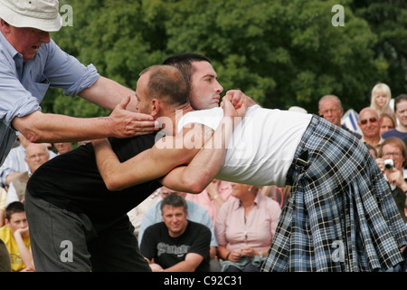 Cumberland Wrestling at the Grasmere Lakeland Sports and Show held on the August Bank Holiday Sunday in Cumbria, England Stock Photo