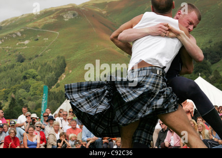 Cumberland Wrestling at the Grasmere Lakeland Sports and Show held on the August Bank Holiday Sunday in Cumbria, England Stock Photo