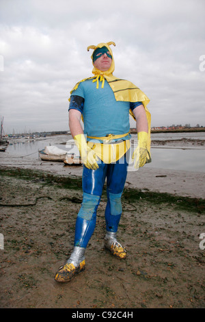 The quirky annual 'Mad' Maldon Mud Race, held one day around New Year depending on the tides, in Maldon, Essex, England Stock Photo