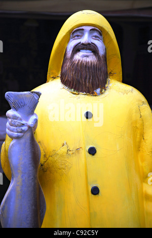 Italy, Liguria, La Spezia, Portovenere, fisherman figure holding a fish Stock Photo