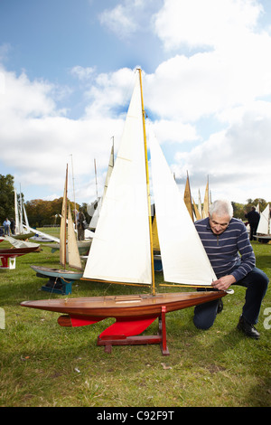 man with model yacht Woodbridge Suffolk Stock Photo