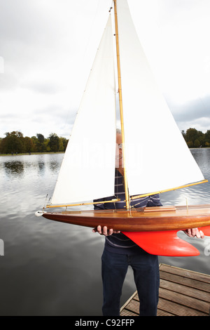 man with model yacht Stock Photo