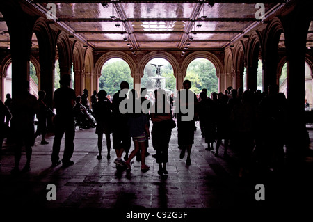 Silhouettes of spectators listening to musicians performing in the arcade at Bethesda Terrace in Central Park, September 11 2011 Stock Photo