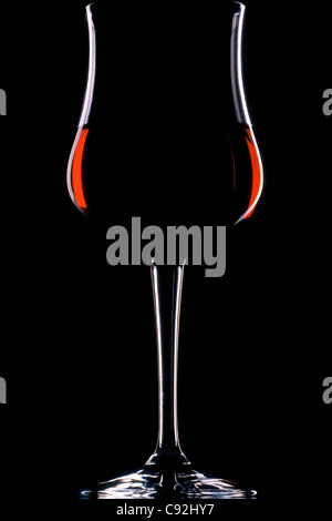 a glass of red wine on black Stock Photo