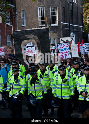 London, UK. 9th Nov 2011. Student protesters march through London escorted by police.  The students are protesting against an increase in tuition fees and Government budget cuts. Stock Photo