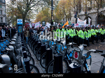 London, UK. 9th Nov 2011. Student protesters march through London escorted by police.  The students are protesting against an increase in tuition fees and Government budget cuts. Stock Photo