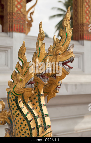 Laos, Luang Prabang, Wat Nong Sikhunmeuang, serpents guarding sim entrance Stock Photo