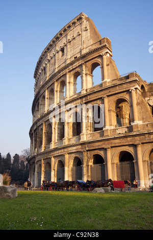 Side view of the Colosseum (Coliseum or Il Colosseo) originally the Flavian Amphitheatre (Latin: Amphitheatrum Flavium) the Stock Photo