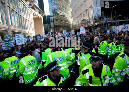 Police lead student march through central London to protest against rises in tuition fees and changes to higher education. The police were out in force as thousands of students marched through central London. Some 4,000 officers were on duty, as demonstrators marched peacefully in a protest against  Stock Photo