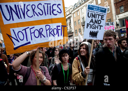 Students march through central London to protest against rises in tuition fees and changes to higher education. Some 4,000 officers were on duty, as demonstrators marched peacefully in a protest against higher tuition fees, funding cuts and 'privatisation' in universities. Stock Photo