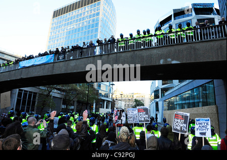 Students and teachers protesting against rises in tuition fees and funding for education march along The London Wall, London, UK. 9th November 2011. Photo: Graham M. Lawrence. Stock Photo