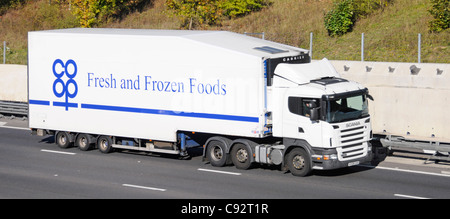 Co op fresh & frozen food supply chain articulated delivery trailer & hgv lorry truck used for food distribution to co operative supermarket stores UK Stock Photo
