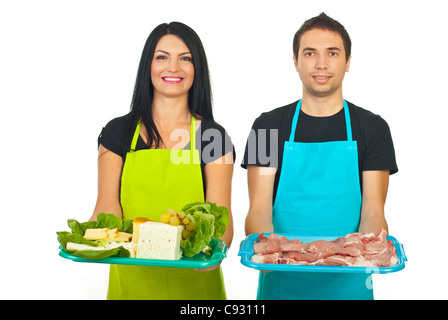 Cheese maker woman and butcher man offering fresh products isolated on white background Stock Photo