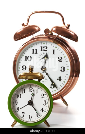 Two alarm clocks on white Stock Photo