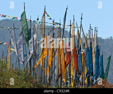 A group of Lungdhar (wind) Buddhist prayer flags on a hill between Jakar and Trongsa. Stock Photo