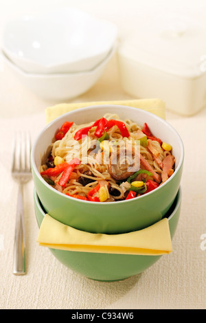 Sautéed Chinese noodles. Recipe available. Stock Photo
