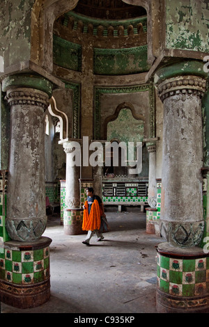 The dilapidated Zenana Bathing Ghat behind the busy Mullik Ghat flower market near Howrah bridge. Stock Photo