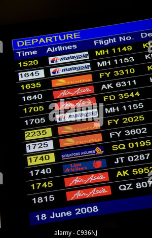 Flight Information screen KLIA Departures Board Stock Photo