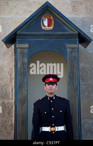 Malta, Europe; A guard in Winter military uniform outside the Presidential Palace in Valletta Stock Photo