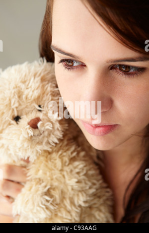 Close up teenage girl with cuddly toy Stock Photo