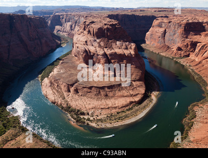 The famous landmark Horseshoe Bend and the Colorado River on a sunny day near Page, Arizona, USA Stock Photo