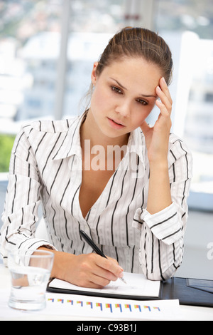Thoughtful young businesswoman Stock Photo