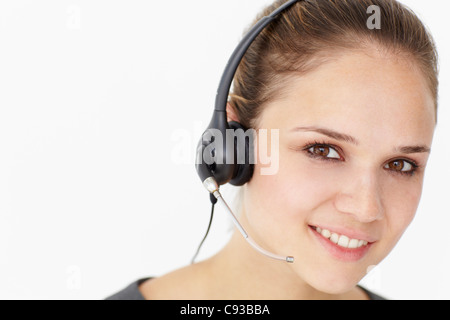 Young businesswoman wearing headset Stock Photo