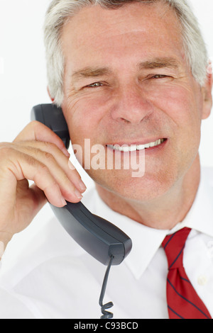 Senior businessman on phone Stock Photo