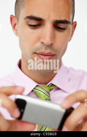 Young businessman using cellphone Stock Photo