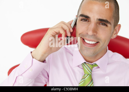 Young businessman using cellphone Stock Photo