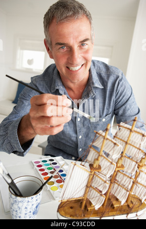 Mid age man model making Stock Photo