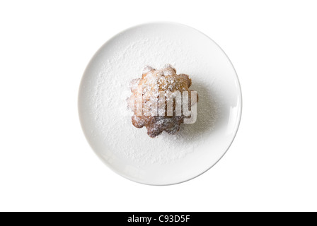 Cake at plate on white background. Top view. Stock Photo