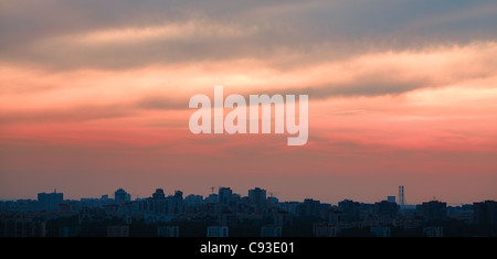 crimson sunset over big city, horizontal orientation Stock Photo