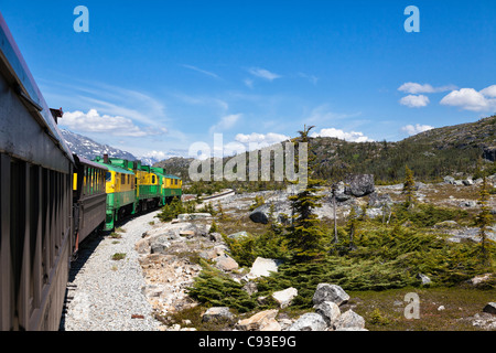 White Pass and Yukon Railroad en route from Skagway Alaska to Fraser,British Columbia in Canada Stock Photo